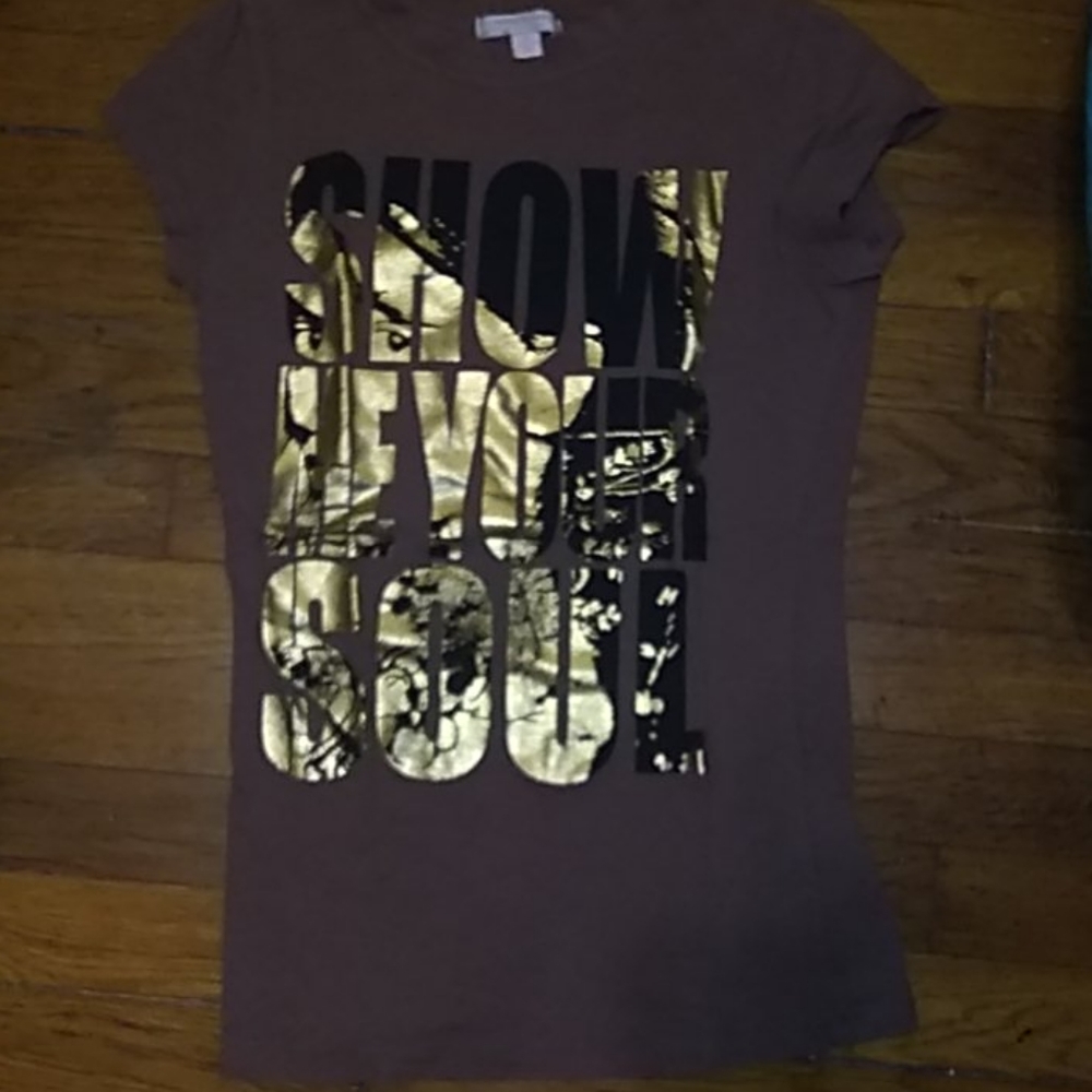Brown tee with gold and black letters